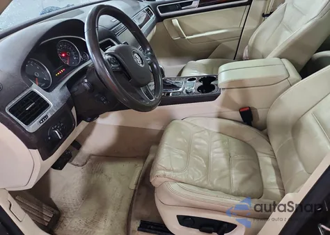 2015 Volkswagen Touareg V6 z USA, uszkodzony, nr VIN WVGEF9BP6FD007020